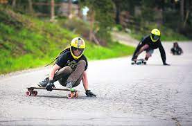 Here's when footbraking comes in to play. Summit County Downhill Skateboarders Realize Need For Summer Speed Despite Risk Rules Summitdaily Com