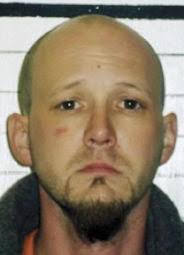 Jailed man hit with charges in beating