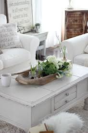 You don't need expensive artwork to the glass candle pillars, cake tray, and candy bowl add structure but let you focus on the pretty. Restyle And Refresh For 2017 7 Great Living Room Design Ideas Table Decor Living Room Living Room Design Decor Wooden Dough Bowl