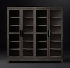 The bookcase has 4 large shelves for books, decor and other collectibles, and each shelf is protected by sliding glass doors. Camino Glass 4 Door Cabinet