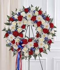 Our red, white & blue sympathy standing basket will honor a dearly departed in the most patriotic way. Red White Blue Standing Wreath At From You Flowers