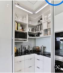 Sold by myhomeeshop an ebay marketplace seller. Tall Larder And Corner Unit With Pocket Doors Houzz Uk