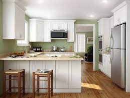 The Difference Between Assembled And Rta Cabinets Stock Cabinet Express Kitchen Cabinet Styles White Shaker Kitchen Cabinets Shaker Style Kitchen Cabinets