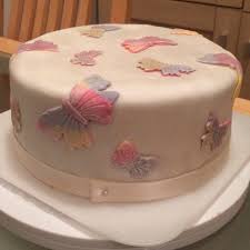 Distribute wonder woman printed stationery as return gifts. Elegant Birthday Butterfly Cake The Great British Bake Off