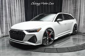 The rs 6 avant rs tribute edition pays homage to the rs 2 with its silver wheels, black roof rails, nogaro blue exterior paint, body color mirrors, red brake calipers, rs sport exhaust, black optic package, and a variety of audi exclusive interior finishes. Used 2021 Audi Rs6 4 0t Quattro Avant Hatchback Loaded W Options Dme Stage 2 Tune Full Ppf For Sale Special Pricing Chicago Motor Cars Stock 17727