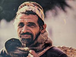 Man in moment of inner peace in Kathmandu market