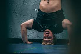 The handstand is one of the most versatile skills in gymnastics. How To Do Handstand Push Ups Tips Tricks For Beginners Invictus Fitness