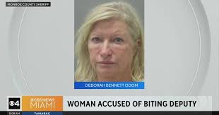 Woman accused of biting Keys corrections deputies