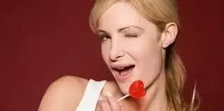 What signs do (shy) women give to show interest in a guy?