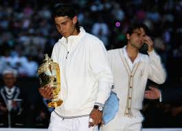 Novak djokovic saves two championship points in wimbledon's longest singles final to retain his title in a thrilling win over roger federer. Wimbledon 2008 Rafael Nadal V Roger Federer 26 Rafael Nadal Fans