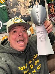 I can't keep my eye off this thing. Got me a Lombardi trophy replica from  Mike's Memorabilia. Super fast shipping. Love it. He's got lots of cool  stuff.