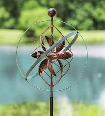 Our Bronze And Patina Spiral Metal Wind Spinner Is Beautiful Enough For Even The Most Formal Sculpture G Metal Wind Spinners Wind Spinners Copper Wind Spinners