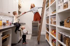 This house has a grocery door from the garage to the. The Walk In Kitchen Pantry Is The New Designer Shoe Closet Wsj