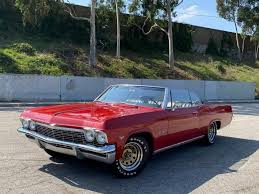 Image result for Regal Red 1965 Chevy II