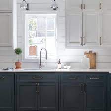 Base cabinets may have a single door, double doors, a series of drawers, or a combination of a drawer and doors; White Top Cabinets And Blue Bottom Cabinets Design Ideas