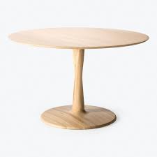 This handmade oak refectory dining table with curved base is the perfect place for family feasts. Natural Oak Torsion Round Dining Table Abc Home