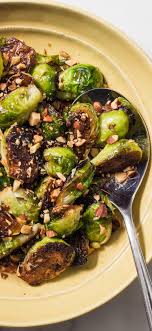 Skillet Roasted Brussels Sprouts With Maple Syrup And Smoked Almonds Brussels Sprouts Are Having A Vegetarian Recipes Cooking Brussel Sprouts Brussel Sprouts