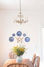 Update the look of your walls using secondhand finds, vintage artwork, chalkboards decorated with antique wall art, such as marquee letters, a chalkboard, and a salvaged door from a general store, it's no wonder this room blurs the line. Farmhouse Wall Art Ideas Farmhouse On Boone