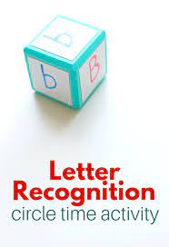 Capital white letters with a pink circle ornament with black stroke. Letter Activity For Circle Time No Time For Flash Cards