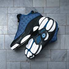Jordan Retro 13 Black And Blue The Air Jordan Retro 13 Low Black Blue Lands This Saturday At Jimmy Jazz Who S Coppin Air Jordans Retro Sneaker Head Jordan Retro 13 Low