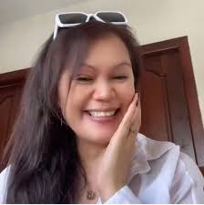 Sally Yusta De Castro