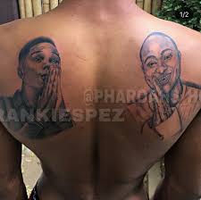 Select from premium dj tira images of the highest quality. Man Tattoos Wizkid And Davidoa S Faces On His Back Freshpopmusic