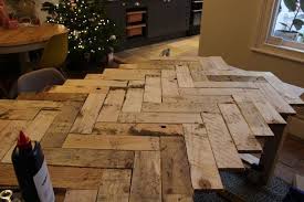 How To Build A Farmhouse Table With A Pallet Wood Herringbone Top Kezzabeth Diy Renovation Blog Build A Farmhouse Table Pallet Table Diy Table Top Design