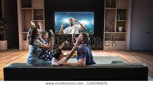 Family Watching Soccer Moment On Tv Stock Photo Edit Now 1230784870 In This Moment Tv Photo Editing