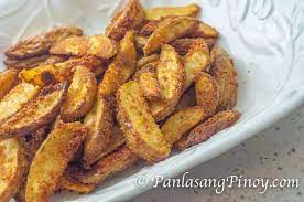 Crispy Baked Yukon Gold Potato Wedges Panlasang Pinoy Recipe Potato Wedges Recipe Oven Roasted Chicken Crispy Potato Wedges