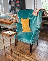 Bad Proportion This Chair Has A Really Tall Back To It And The Tall Pillow On It Makes It Look Even More Unpr In 2020 Velvet Wingback Chair Blue Velvet Chairs Chair