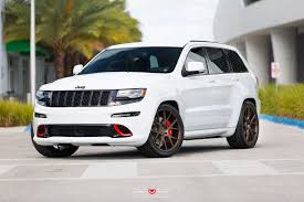 Black And Red Jeep Grand Cherokee Custom Jeep Grand Cherokee With Red Accents And Vossen Wheels Jeep Srt8 Srt Jeep Jeep Grand Cherokee Srt