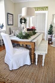 This dining table is made of solid reclaimed wood, which has the characteristics of different woods like mahogany, teak, mango wood, acacia, etc. Simple Rustic Christmas Dining Room Decor Liz Marie Blog