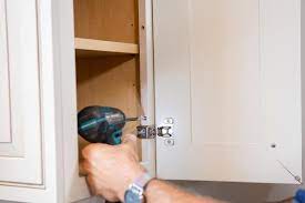 I do this with a screwdriver, but if your screws are on the inside, it's safe to use a drill to do this. How To Remove A Kitchen Cabinet Hgtv
