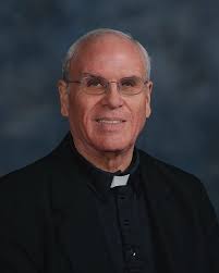 ADOM :: 'Brilliant, gentle' priest