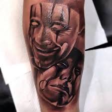 This style of tattoo is popular among latin and asian gang members. Smile Now Cry Later Tattoo In Chicano Style Tattoo Design
