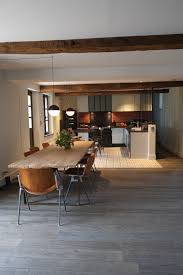 Une Maison Tres Masculine Pierre Bois Metal By L Atelier D Archi Salle A Manger Et Salon Decoration Salle A Manger Decoration Salon Salle A Manger