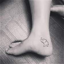 50 Creative Tiny Foot Tattoo Ideas With Pictures Gravetics Tiny Foot Tattoos Small Foot Tattoos Elephant Tattoos