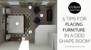 5 Tips For Arranging Furniture In An Odd Shaped Room Curio Design Studio Bedroom Furniture Layout Small Apartment Furniture Apartment Furniture Layout