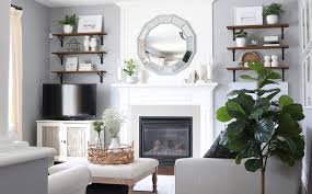 The fireplace was installed (by the fireplace manufacturers) in a basic wood frame that our contractor put up ahead of time. How To Decorate A Fireplace Wall Without Built Ins Willow Bloom Home