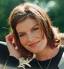 Jeanne is a pale skinned voluptuous young woman, with thick long eyelashes and yellow eyes, short pink hair with a piece of fringe that falls between the middle of her face. Rene Russo Wikipedia