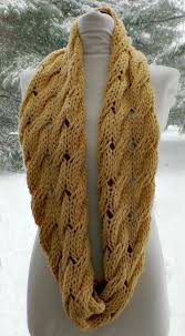 Infinity scarves cowl snood knitted crocheted wool. Free Knitting Pattern For Willow Infinity Scarf Cowl Cable Infinity Scarf Knit Infinity Scarf Knitting Pattern Scarf Knitting Patterns Scarf Crochet Pattern
