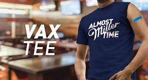 Golfball on the golf course. Miller Lite Sells One Sleeved Vax Time Shirts For Covid Vaccine