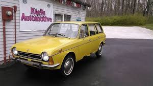 Image result for Herald Yellow 1975 Subaru