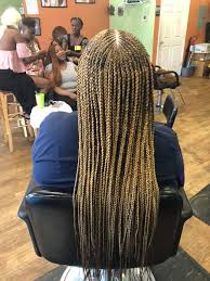 Weave in the extensions and simply divide the braids into two. Assi African Hair Braiding Weaving Home Facebook
