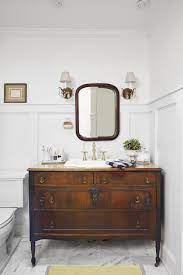 The sink basin cuts through the wooden plank and if your bathroom is a small powder room that doesn't require a ton of storage, consider opting for a. 25 Bathroom Lighting Ideas Best Bathroom Vanity Lighting Ideas