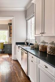 White kitchen cabinets quartz countertops. Long Kitchen Pantry With White Cabinets And Black Quartz Countertops Transitional Kitchen