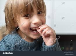 Adorable Young Boy Laughing Touching His Stock Photo 2614579741