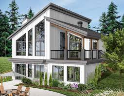 Lake house plans offer sweet outdoor living! Plan 22522dr Modern Vacation Home Plan For The Sloping Lot In 2021 Modern Style House Plans Drummond House Plans Small Lake Houses