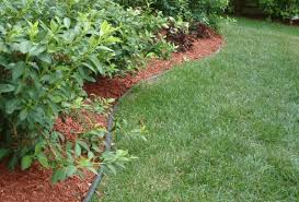 Easily use to create a raised layer of mulch, rocks or soil. How To Install Lawn Edging Primrose Blog