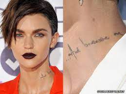 Ruby Rose S 48 Tattoos Meanings Steal Her Style Ruby Rose Rose Neck Tattoo Ruby Rose Tattoo